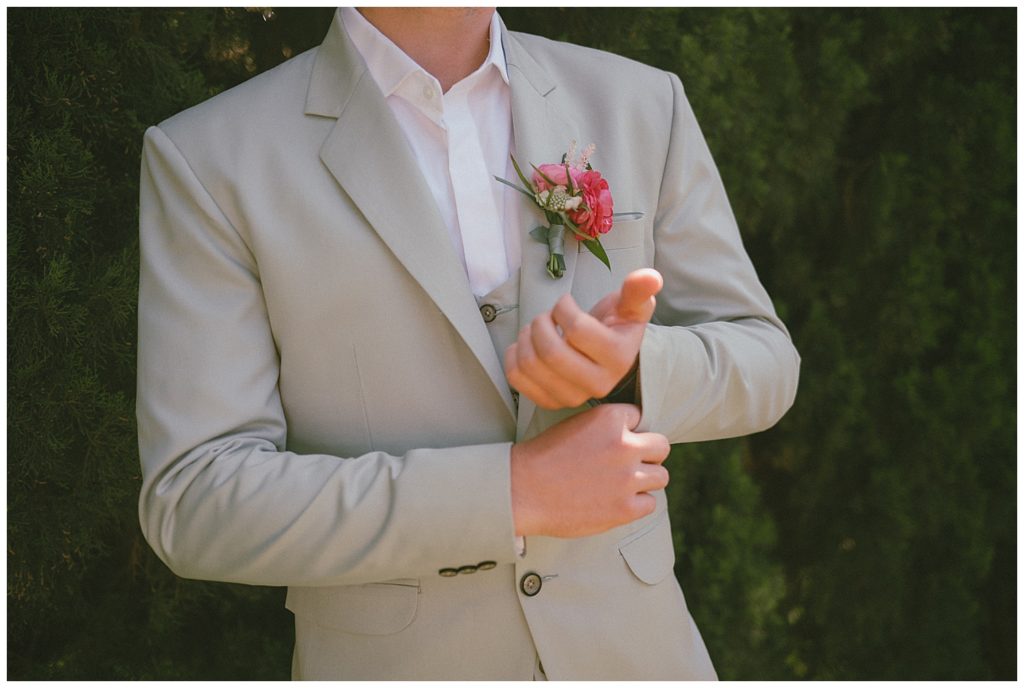 san diego california intimate backyard elopement wedding - san diego wedding and lifestyle photographer - getting ready wedding photos - groom getting ready - gray groom suit