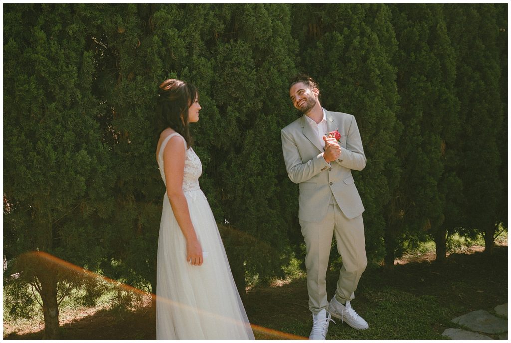 san diego california intimate backyard elopement wedding - san diego wedding and lifestyle photographer - first look wedding photos - a line wedding dress - gray groom tuxedo