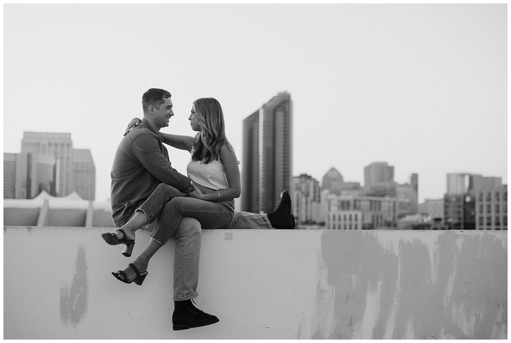 rooftop engagment pictures - rooftop couples photos - downtown san diego engagement session - san diego engagement photographer - nighttime engagement photoshoot - black and white engagement photo